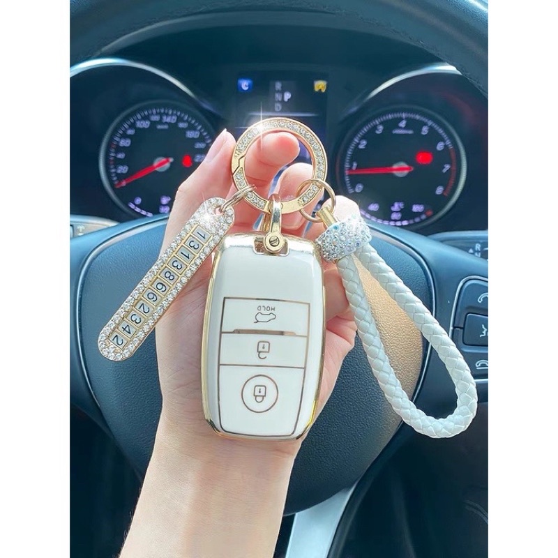 Móc khóa ô tô nữ lưới dây mặt khóa kim cương nhẫn dây buộc dễ thương kèm bảng số điện thoại chống thất lạc