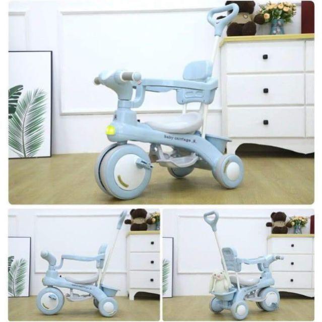Xe đạp 3 bánh 618, xe đẩy du lịch kiêm xe chòi chân cho bé, có cần đẩy phát nhạc và khung bảo vệ bé