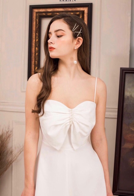 Đầm xoè xếp nơ ngực