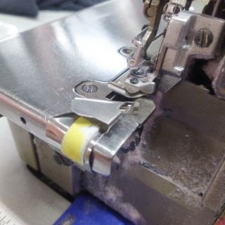 Gá chống quăn máy vắt sổ