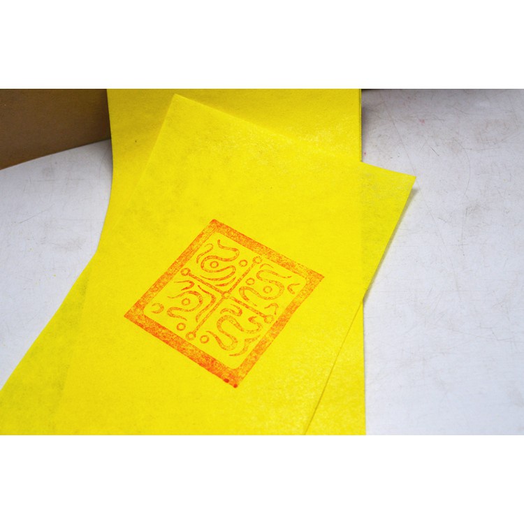 100 tờ Giấy hoàng chỉ vàng in vẽ phù kt 7x27cm