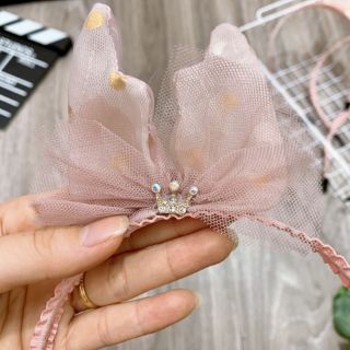 Bờm nơ lệch cho bé gái