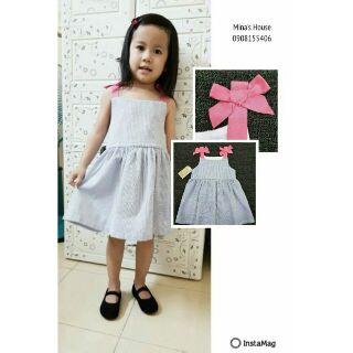 Váy dây thắt nơ hồng bé gái