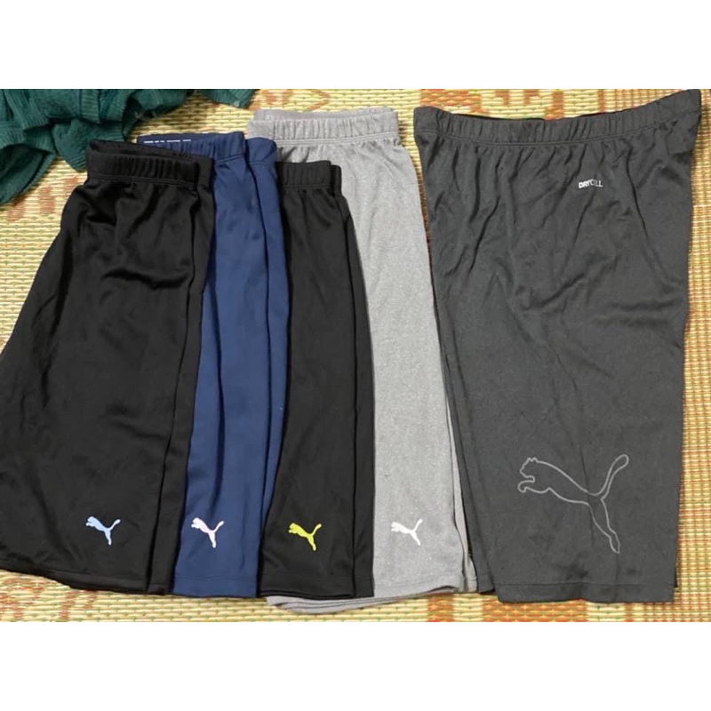 quần short puma bé trai