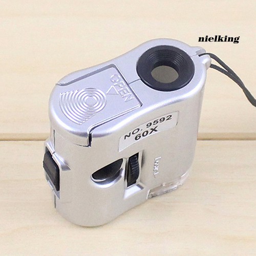 Kính lúp mini phóng to 60X có đèn LED dùng thẩm định vật dụng tiện lợi