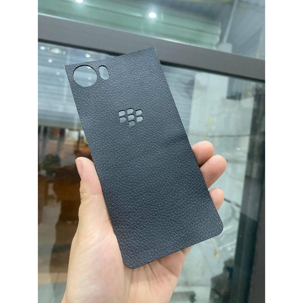 Dán da lưng Blackberry keyone/ k1 trơn màu đen