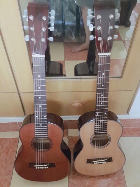 Đàn guitar 1/2 acoustic + bao da