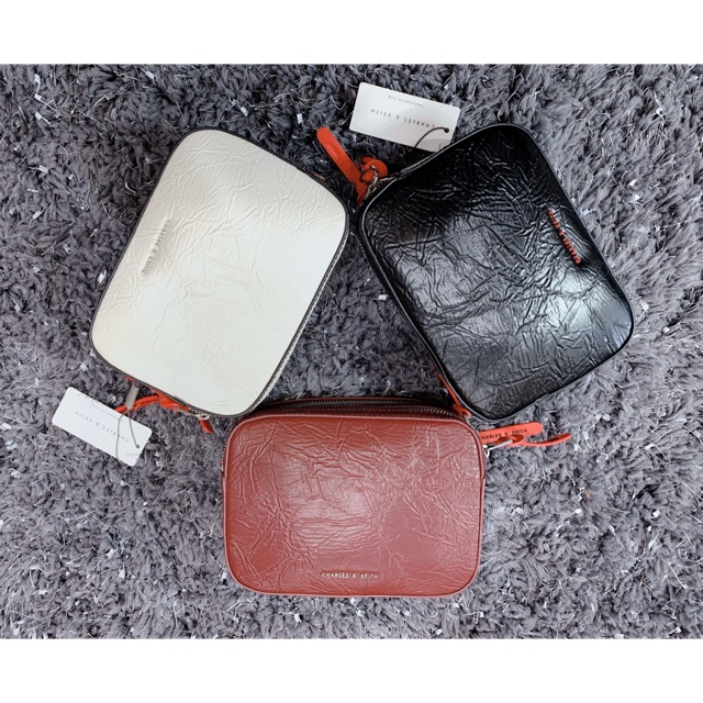 mẫu cnk 2 khoá da nhăn