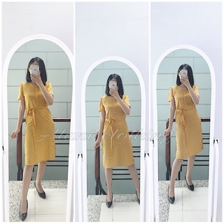 Đầm bi vàng thắt nơ eo