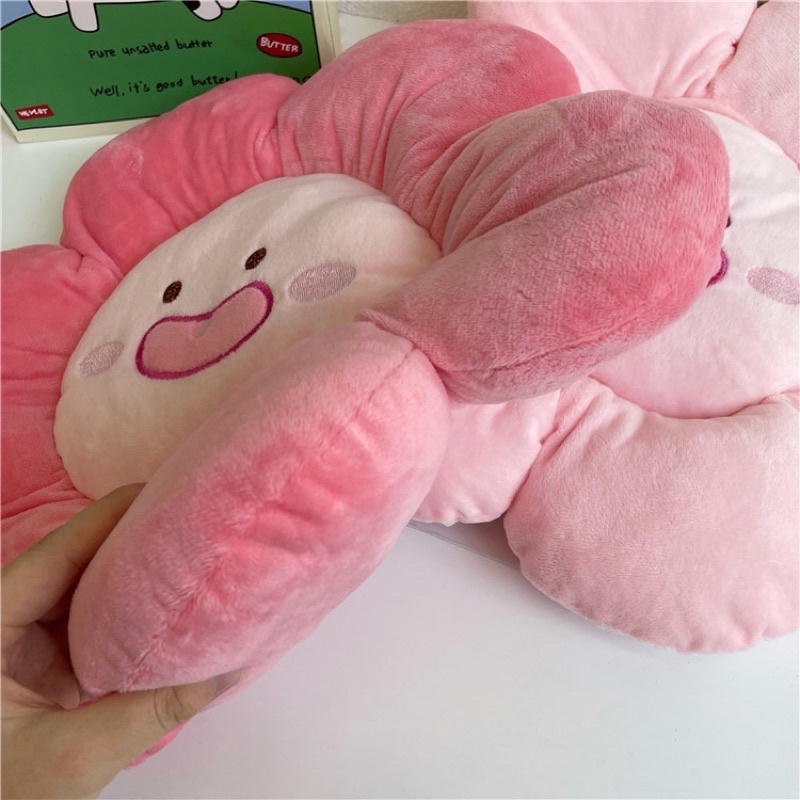 Gối bông hoa sún răng đáng yêu