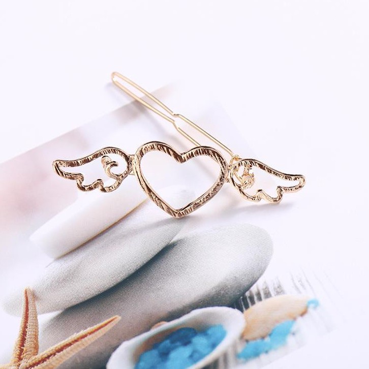 Kẹp tóc đính hình trái tim thiên thần cho các bạn nữ