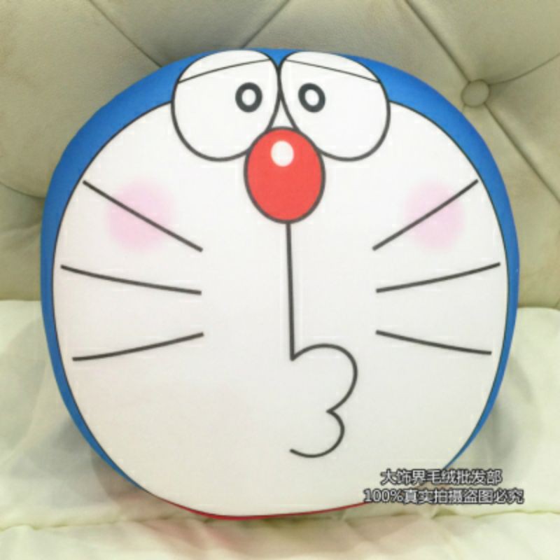 Gối tròn doraemon ruột 100% hạt xốp