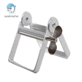 Dụng cụ nặn tuýp kem đánh răng bằng kim loại
