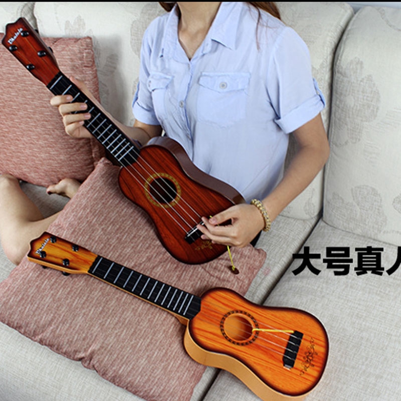 Đàn ukulele mini họa tiết trái tim theo phong cách acoustic