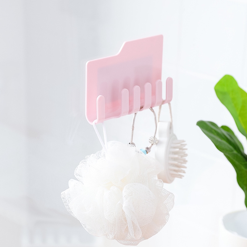 Handy wall mounted toothbrush/toothpaste/razor holder