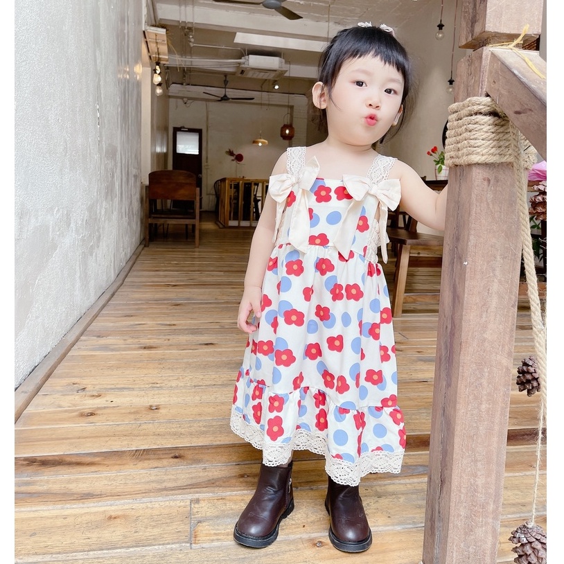 Váy hoa ren 2 dây đính nơ trước ngực bé gái 8-20kg