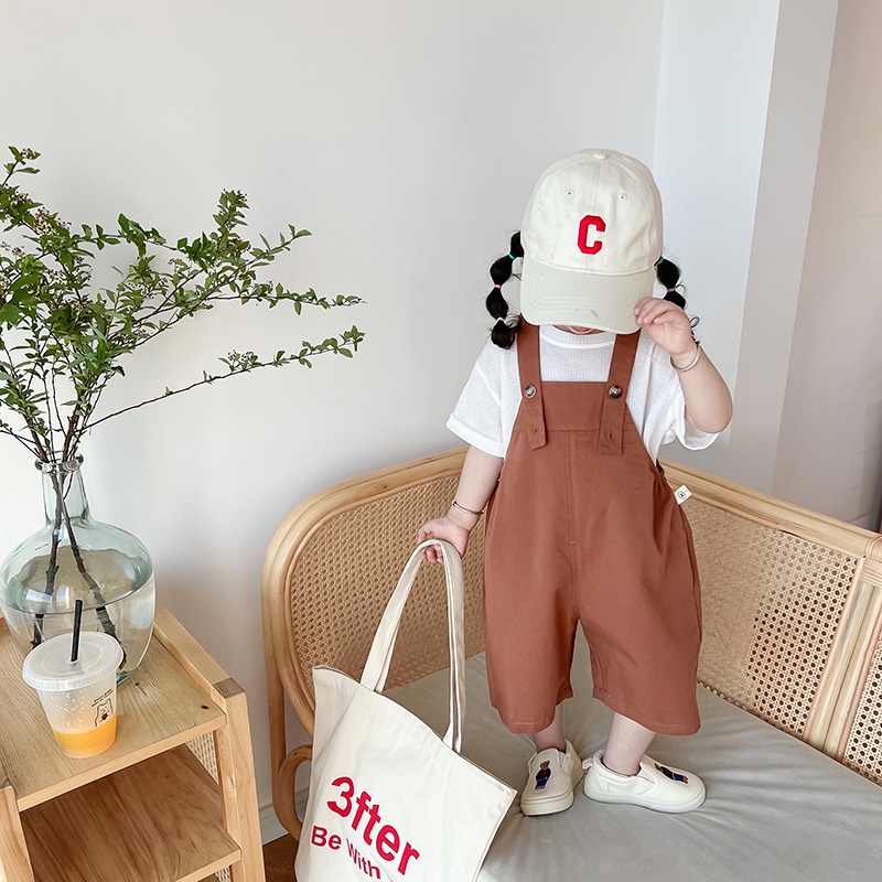 Quần yếm cho bé chất liệu vải thô khaki, có dây điều chỉnh, có túi hai bên phong cách cá tính dành cho bé từ 7-24kg