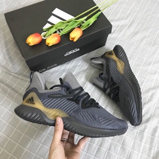 Giày Alpha xanh vàng