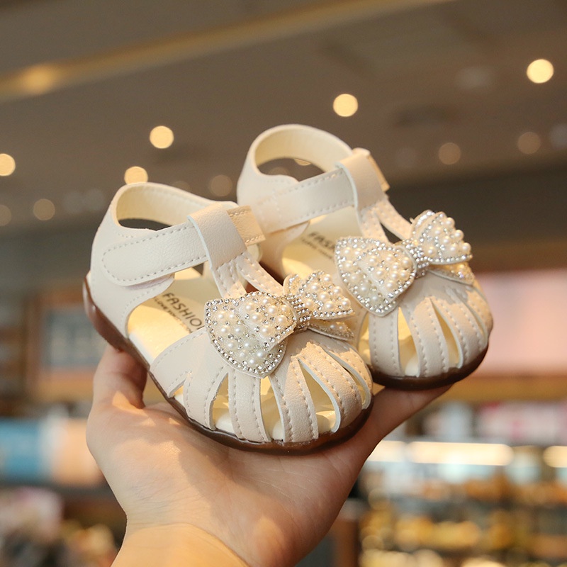 Giày búp bê đính nơ ngọc Sandal dép tập đi chống vấp êm mềm cho bé gái DTD14