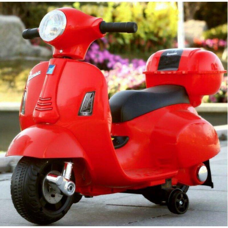 Xe máy điện vespa cho bé nhẵm chân ga Q518