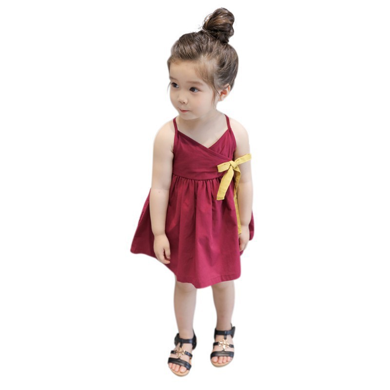 Đầm hai dây thắt nơ dễ thương cho bé