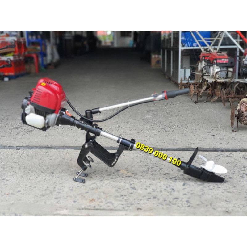 Máy cắt cỏ chạy thuyền. Máy chạy Ca No và xuồng động cơ bốn thì. Động cơ đẩy thuyền trên nước
