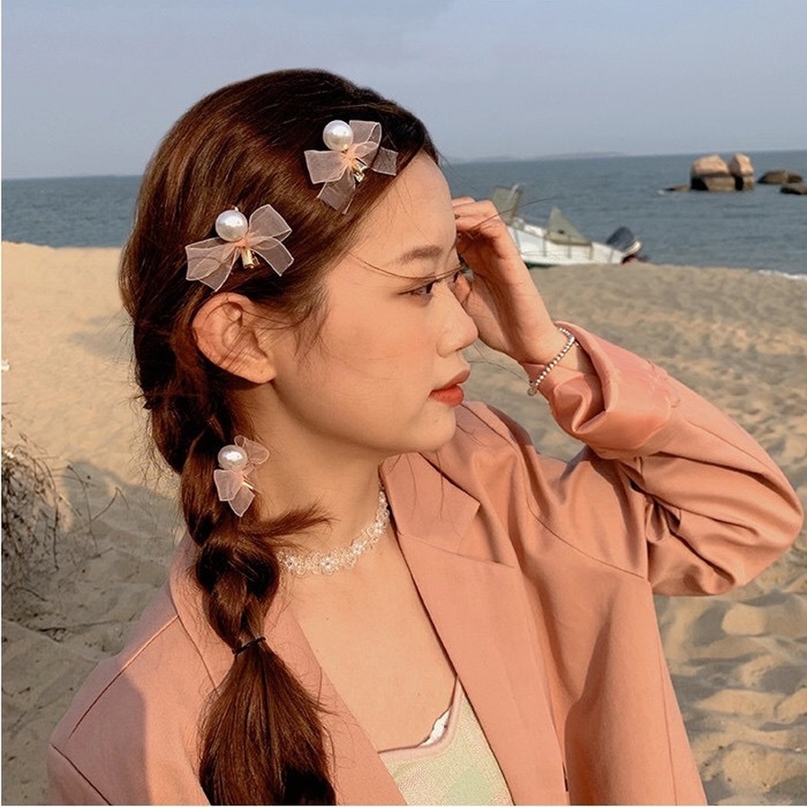 Kẹp tóc hình nơ đính ngọc trai xinh xắn dành cho nữ