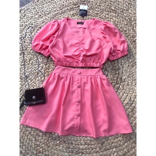 Quần váy bọc nút + áo crop bo chun
