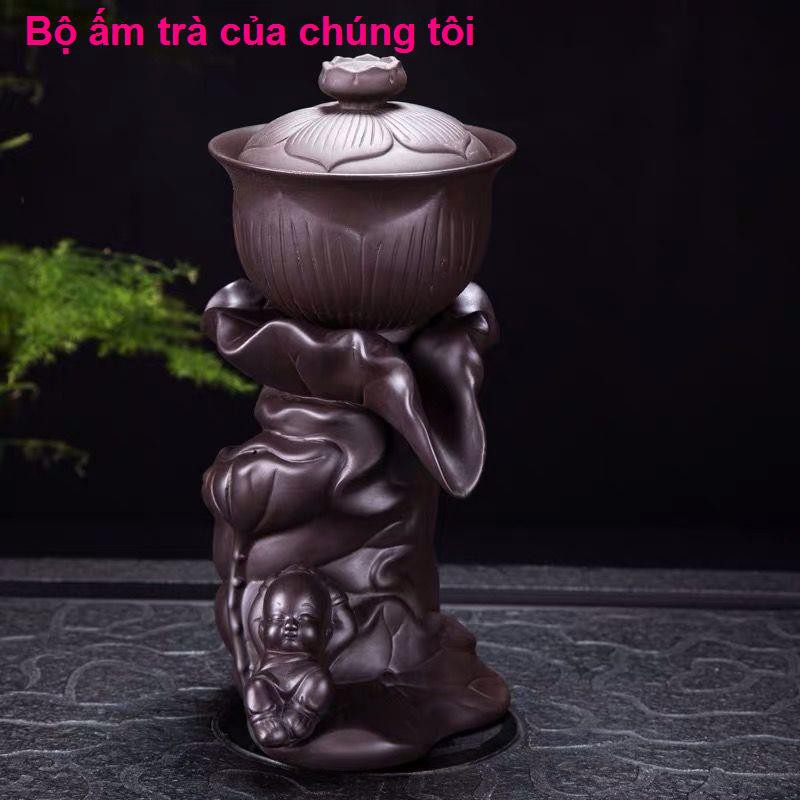 bàn học gấp gọnMáy xay đá cát tím Nước tự động Xả Ấm trà Tách Kung Fu Bộ Sáng tạo một chiếc bình nghệ thuật Lư