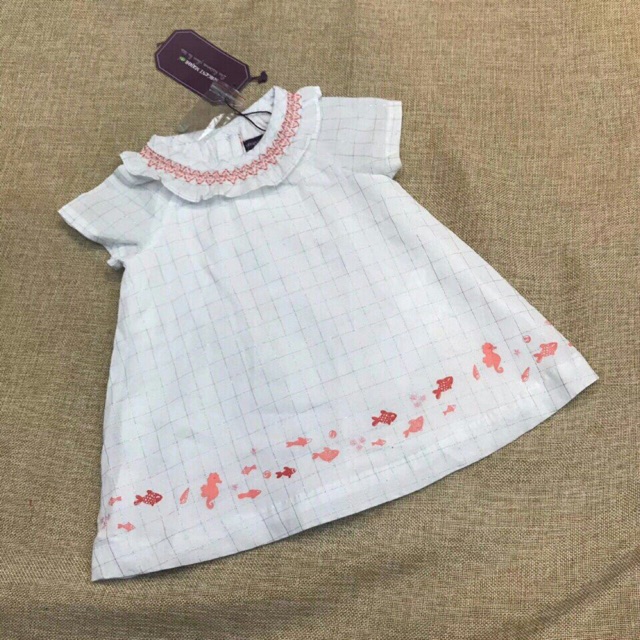 Váy cổ thêu nhún bèo bé gái