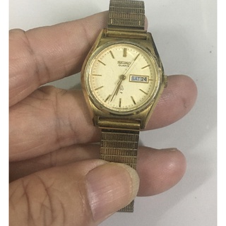 Đồng hồ seiko nữ dây chun mầu vàng