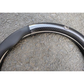 Bọc vô lăng, bọc da vô lăng carbon có logo MEC