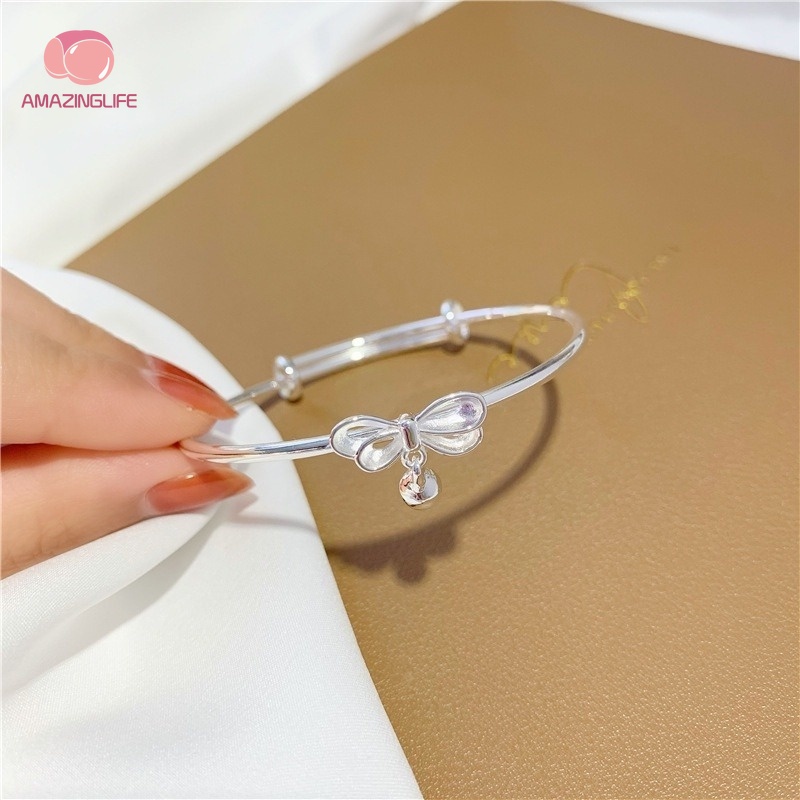 Vòng Đeo Tay Mạ Bạc Phối Chuông Và Nơ Dễ Thương Có Thể Điều Chỉnh