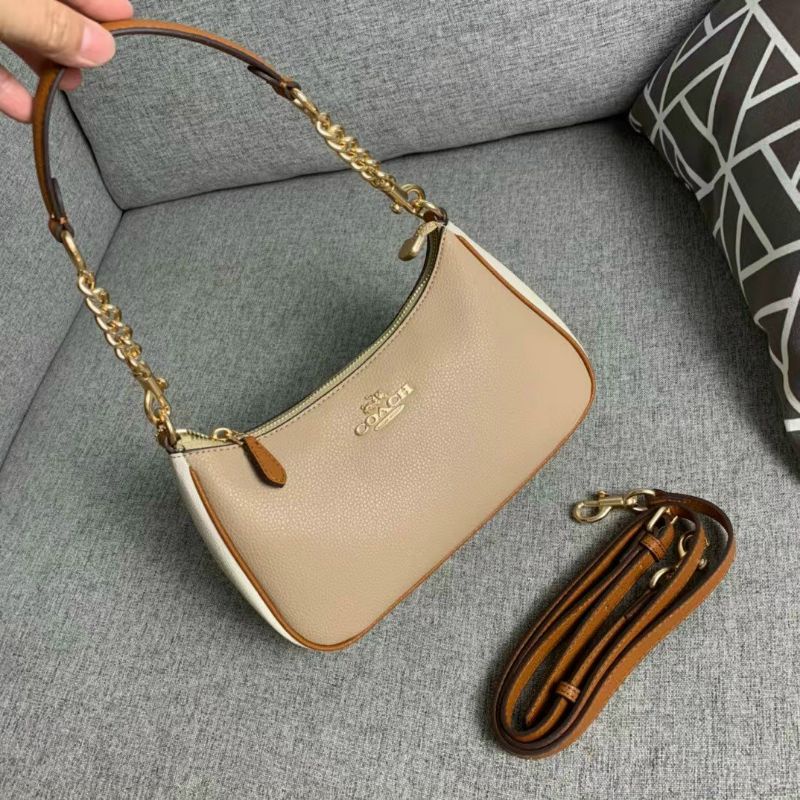 Túi Co@ch Teri dáng thuyền kẹp nách siêu sang