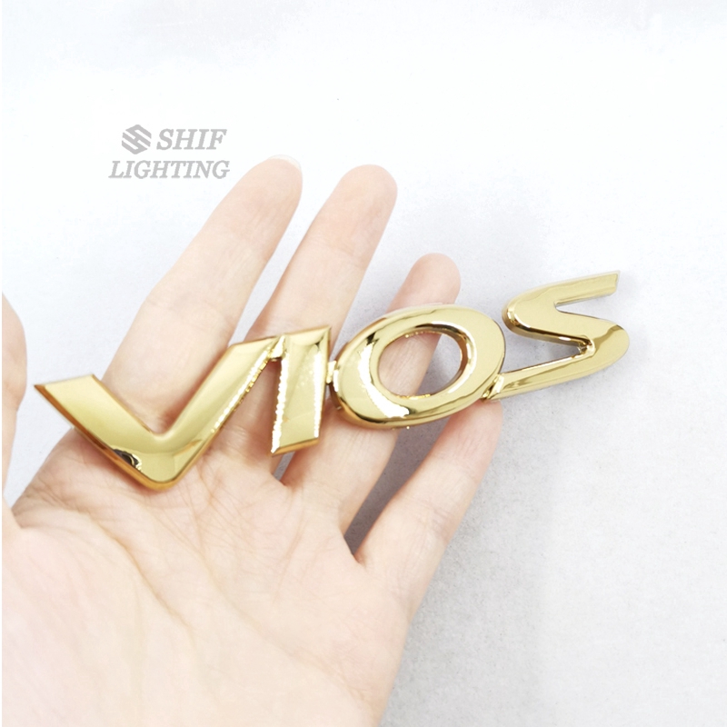 Sticker làm từ ABS màu vàng đồng hình logo chữ VIOS dùng dán trang trí thay thế cho xe hơi TOYOTA