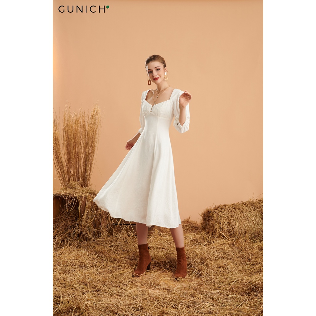 Đầm midi tay lỡ màu trắng Gunich