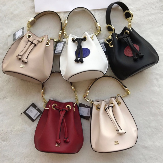 Túi L Y N xuất dư