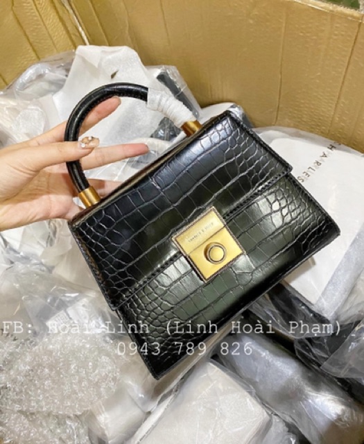 - Túi xách khuy tròn xuất dư