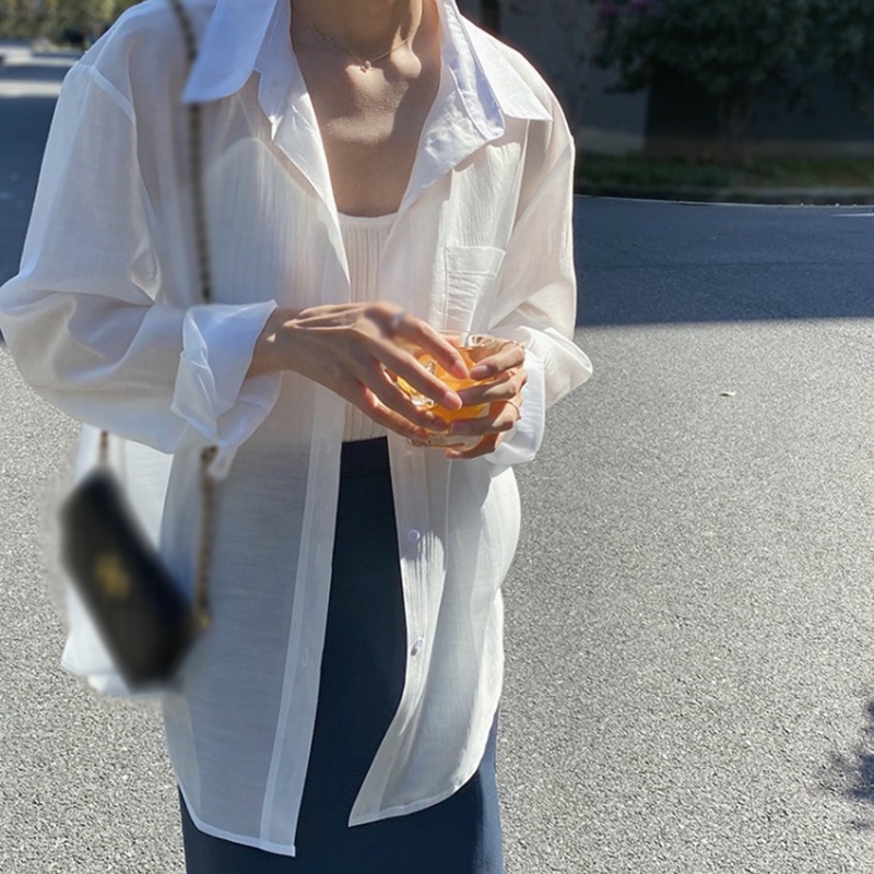 Áo sơ mi tay dài phối nút thiết kế oversized cho phái nữ