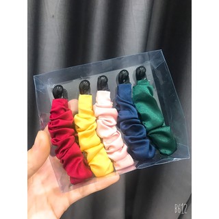 Cặp dọc nơ tạo phồng chân tóc