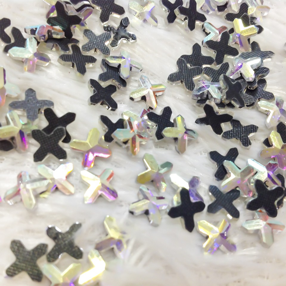Đá ủi nhiệt hình ngôi sao 4 cánh, hạt đá ủi áo đầm ngôi sao ánh 7 màu hat hong kong siêu đẹp