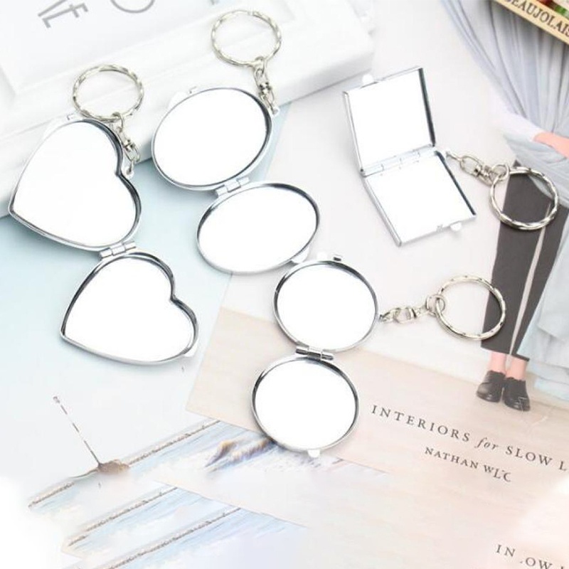 Móc khóa có gương trang điểm tiện dụng