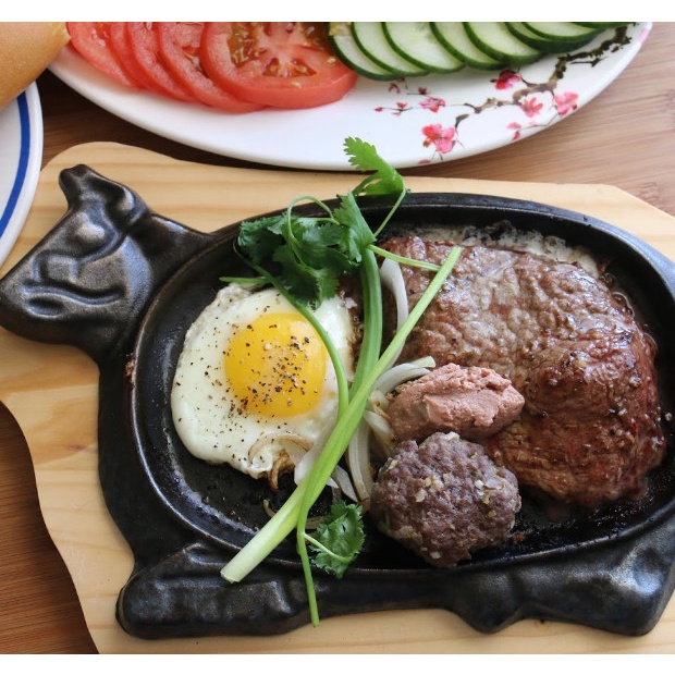 Chảo gang chống dính làm bò né kèm đế lót gỗ - Chão gang làm bò bít tết phủ lớp chống dính hình con bò có kèm đế gỗ