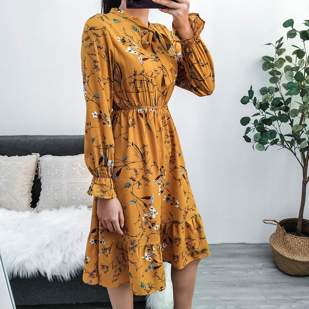 Đầm maxi đuôi xếp ly dài tay họa tiết hoa nhí