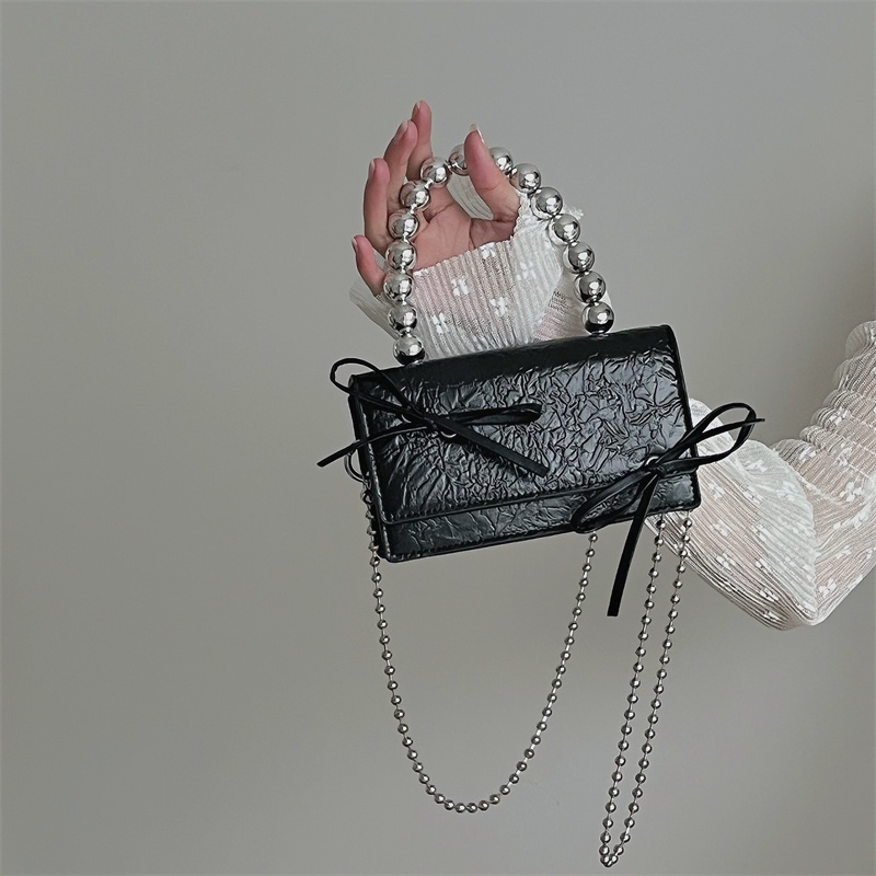 Túi đeo chéo vai IELGY đính đá họa tiết nơ và ngọc trai giả phối dây xích cao cấp cho nữ