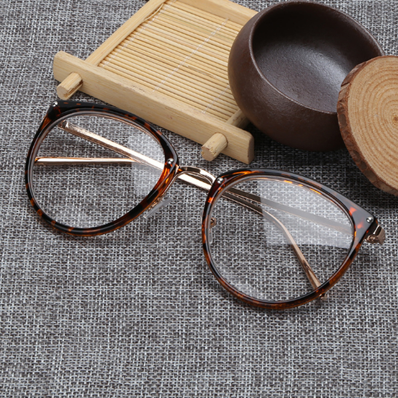 Mắt kính gọng tròn trong suốt thời trang cho nữ