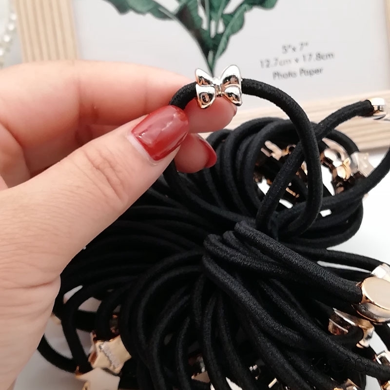 Dây buộc tóc cao su co giãn mặt dây nhiều kiểu dáng màu vàng thời trang cho nữ