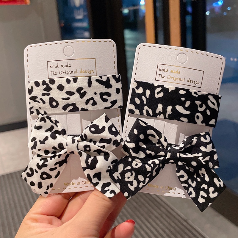 Kẹp tóc hình nơ họa tiết da báo phong cách retro dành cho nữ