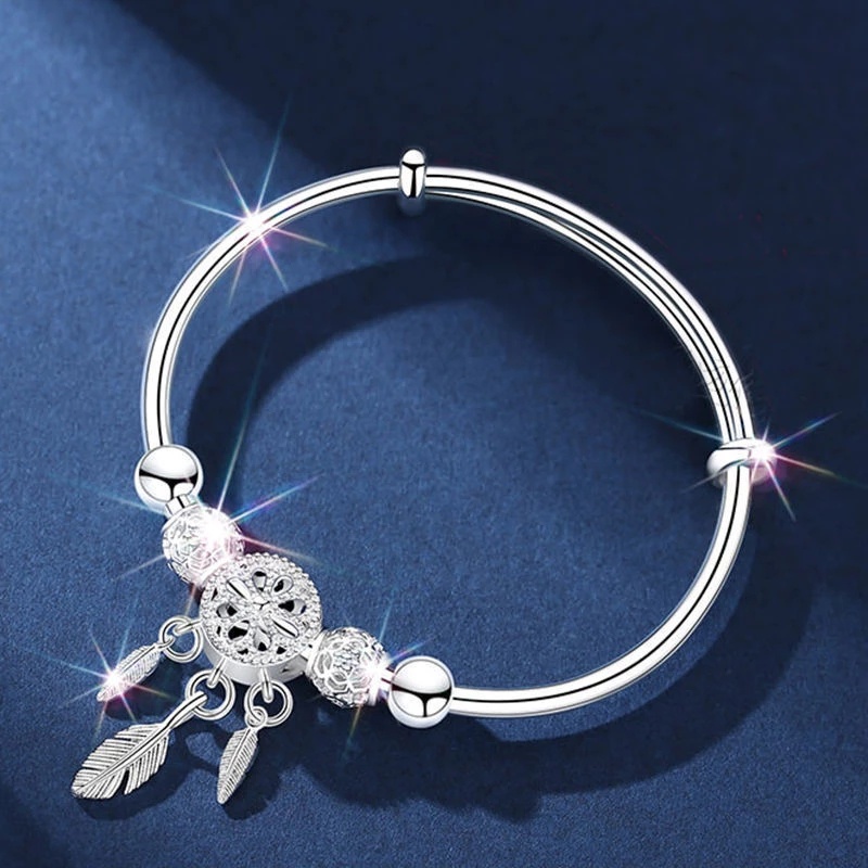 Vòng Đeo Tay Màu Bạc Hình Dreamcatcher Phối Lông Vũ Thời Trang Cho Nữ
