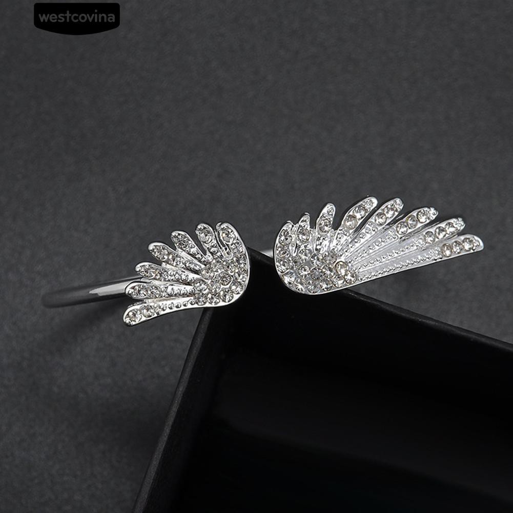 Vòng đeo tay kim loại mạ bạc kiểu cánh chim có phối đá đầy cá tính